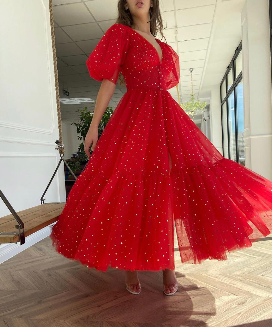 Red midi dress with v-neck, short sleeves and starry fabric