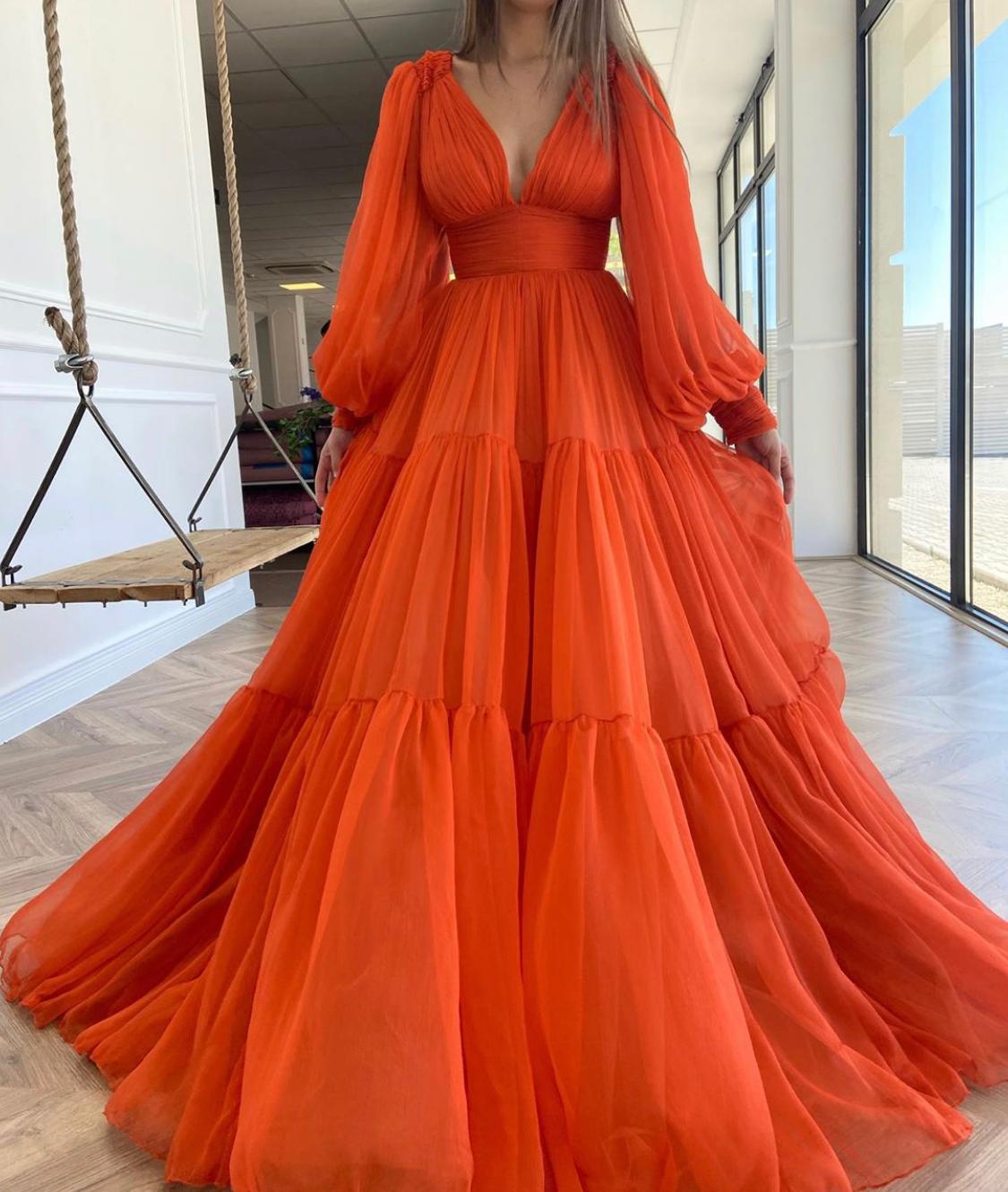 Orange A-Line dress with v-neck and long sleeves