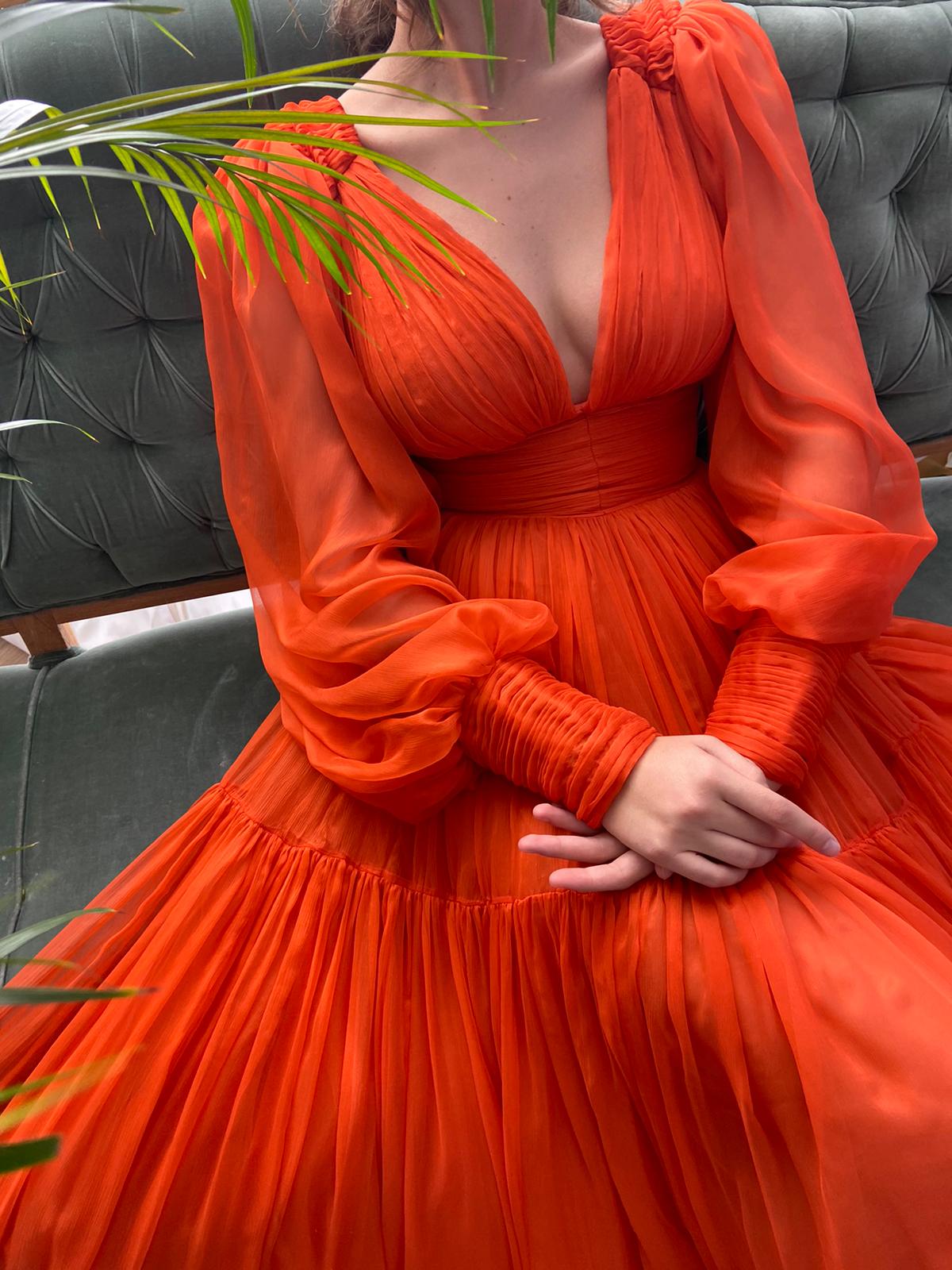 Orange A-Line dress with v-neck and long sleeves