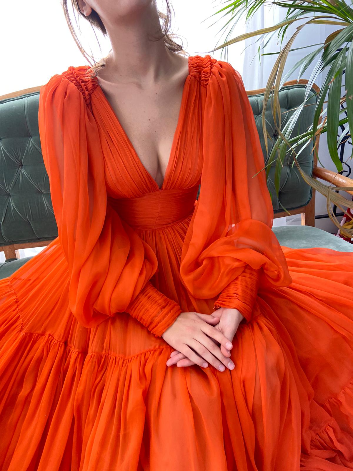 Orange A-Line dress with v-neck and long sleeves