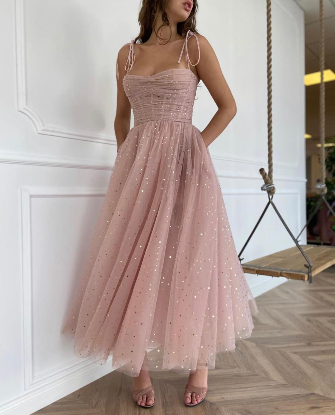 Pink midi dress with spaghetti straps and starry fabric