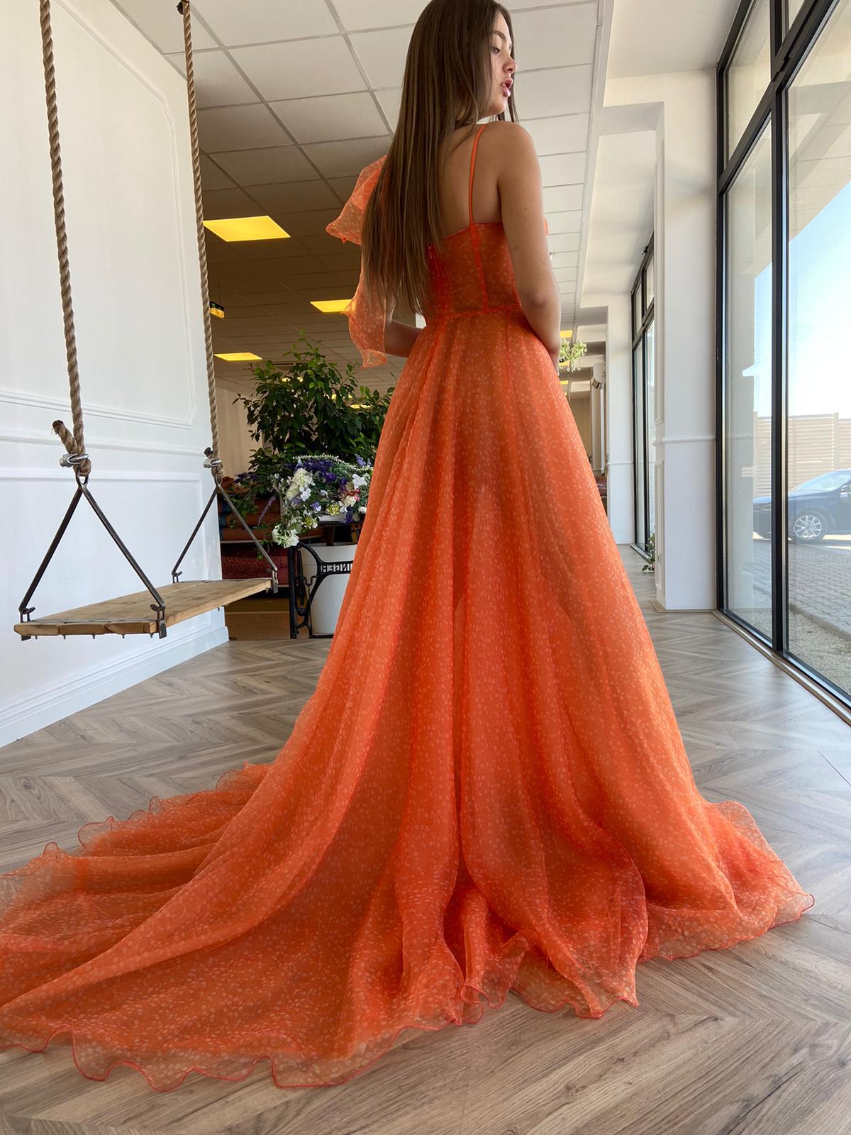 Orange A-Line dress with spaghetti straps and one shoulder sleeve