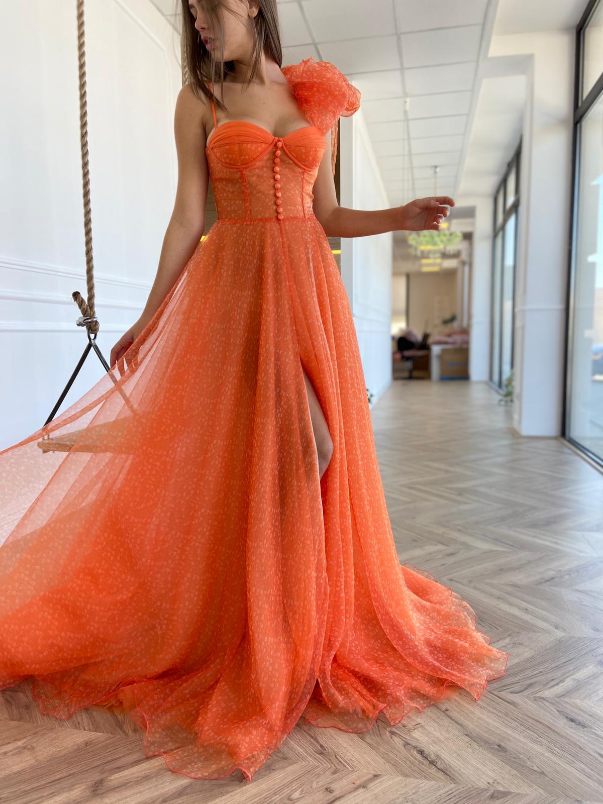 Orange A-Line dress with spaghetti straps and one shoulder sleeve