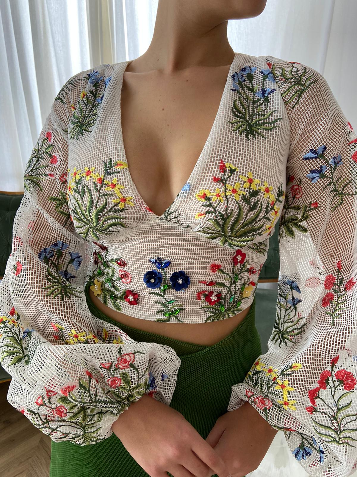 White blouse with embroidery, v-neck and long sleeves