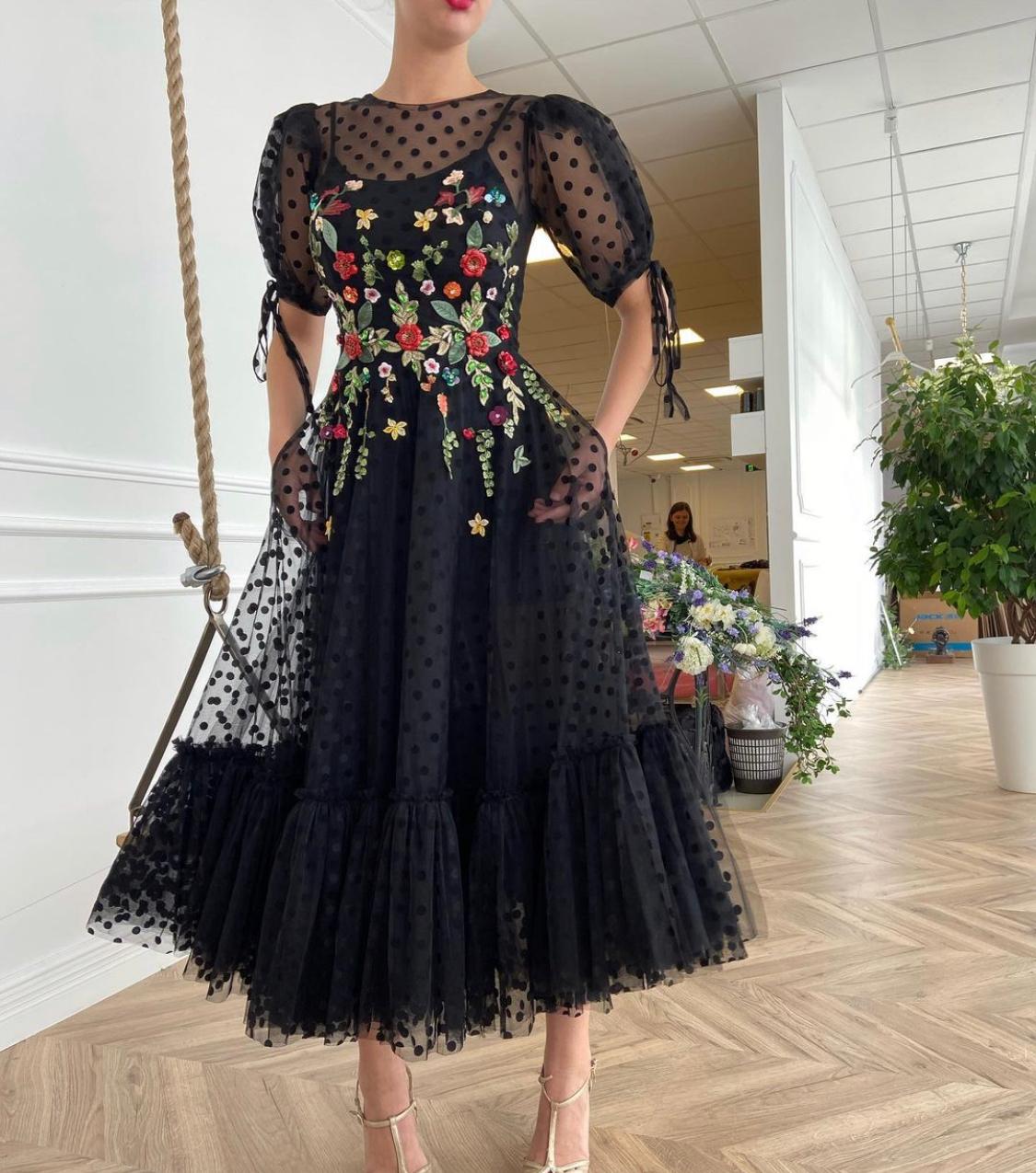 Black midi dotted dress with short sleeves and embroidery