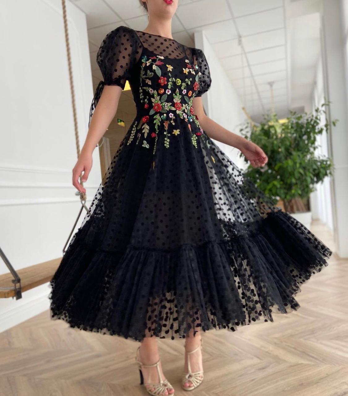 Black midi dotted dress with short sleeves and embroidery