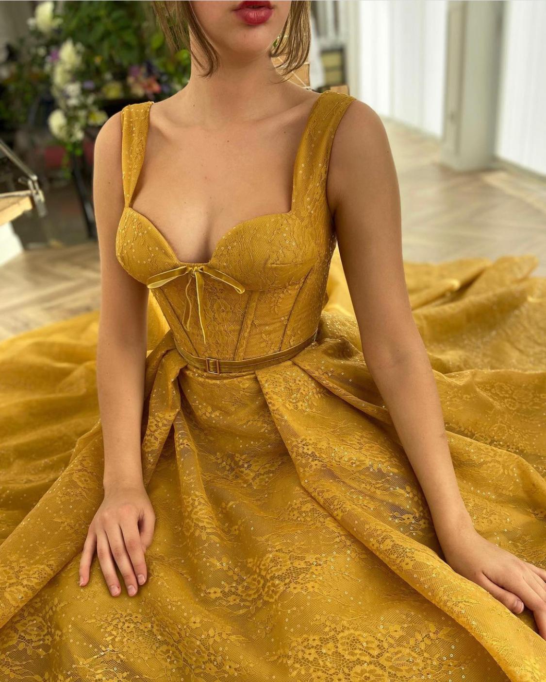 Yellow A-Line dress with straps and belt
