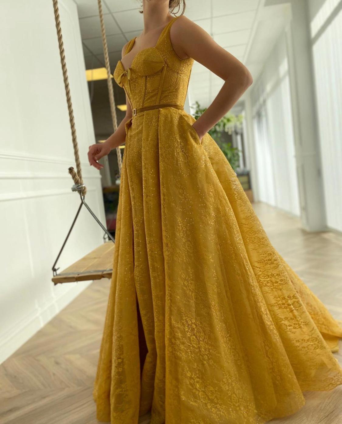 Yellow A-Line dress with straps and belt