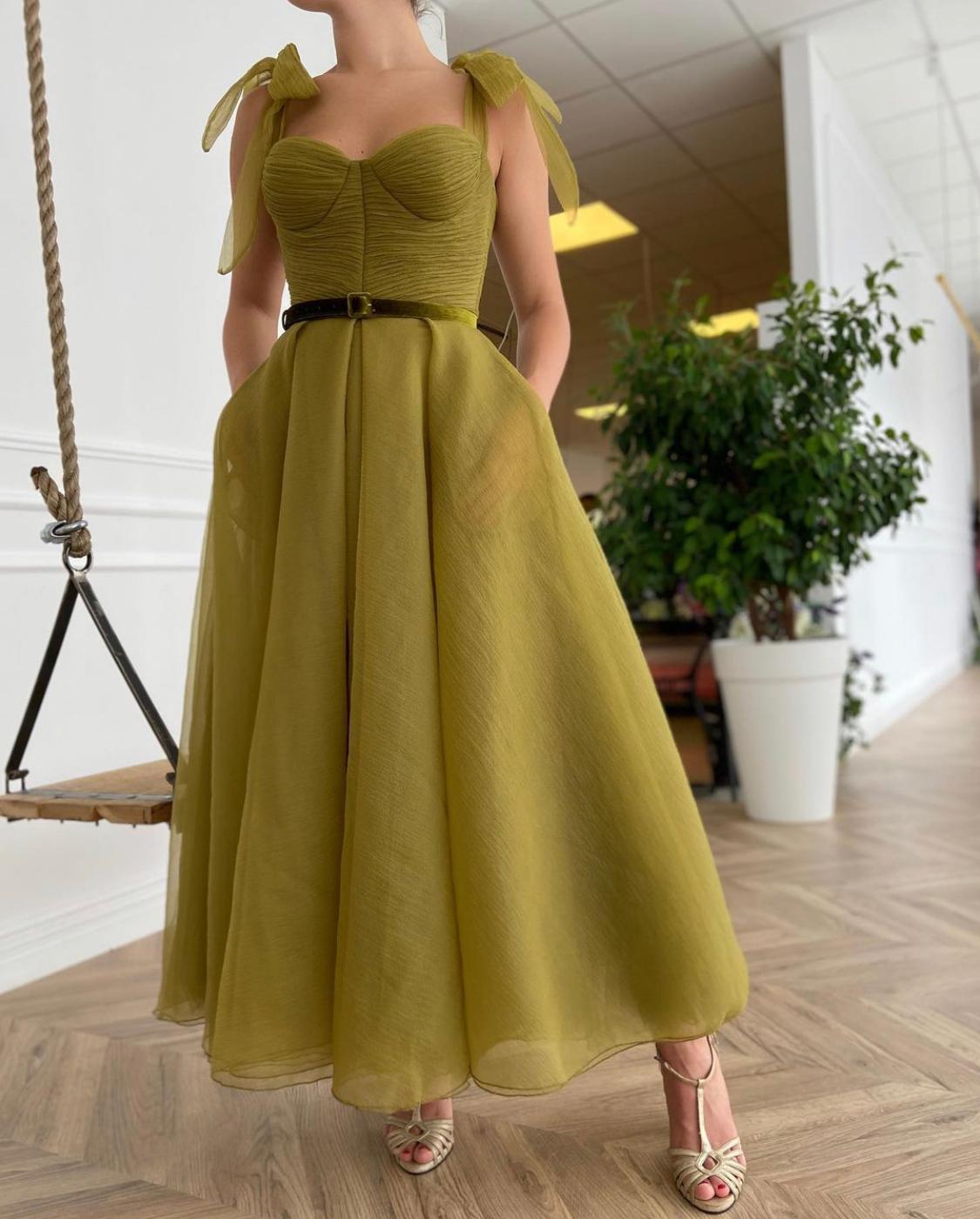 Green midi dress with bow straps