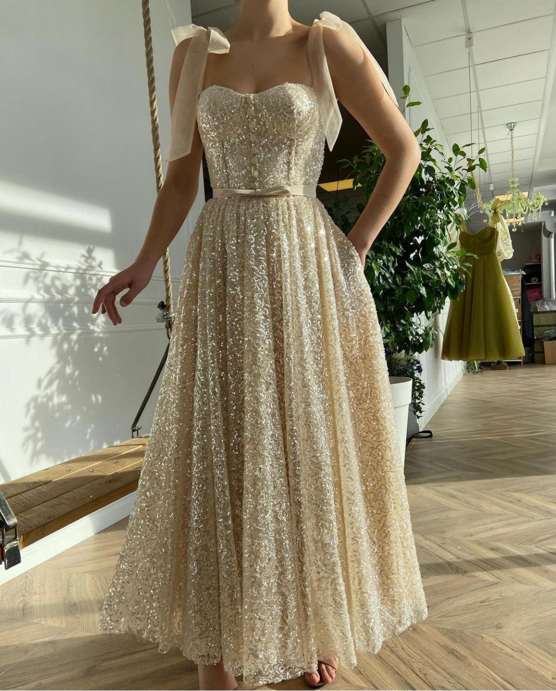 Beige midi dress with bow straps