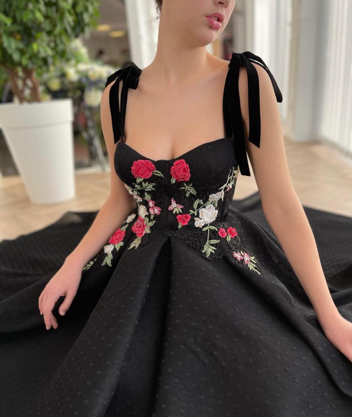 Black midi dress with bow straps and embroidery