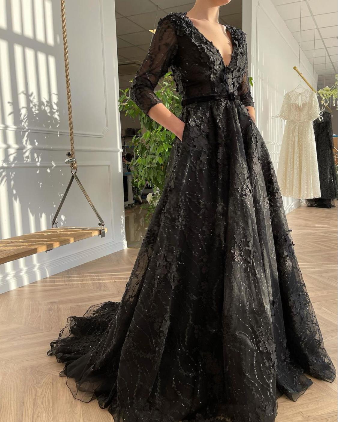 Black A-Line dress with belt, v-neck, lace, embroidery and long sleeves
