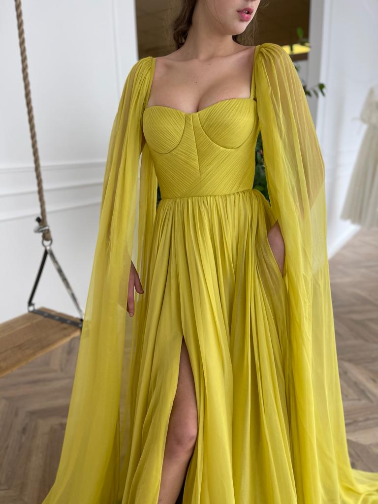 Yellow A-Line dress with cape sleeves