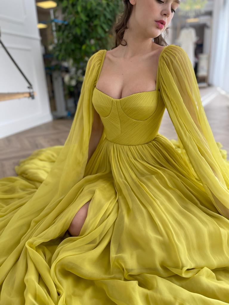Yellow A-Line dress with cape sleeves