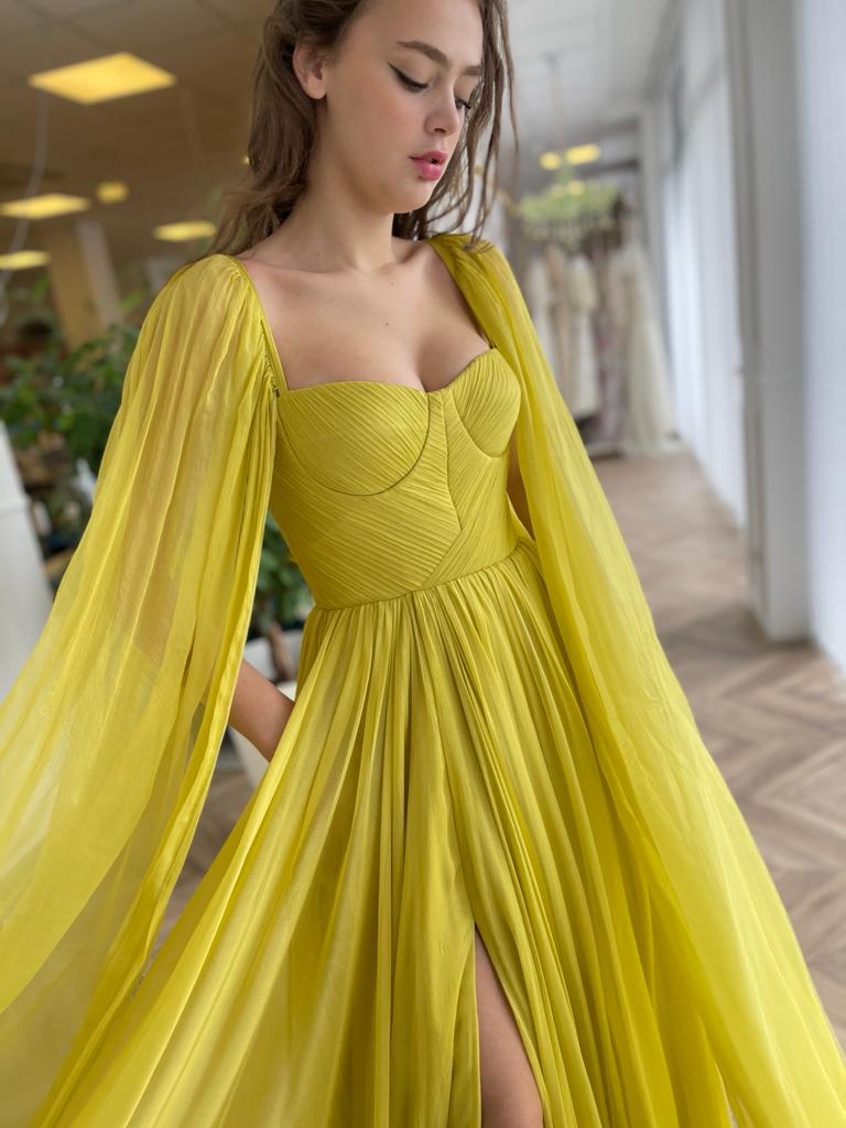 Yellow A-Line dress with cape sleeves