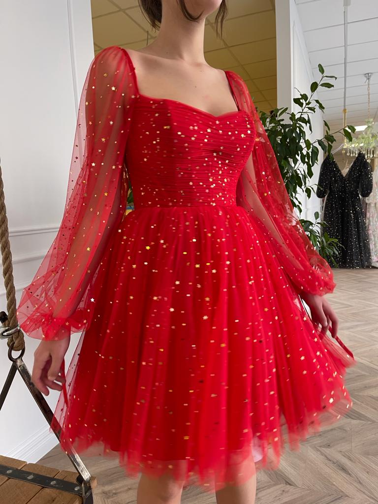 Red mini dress with long sleeves and starry fabric