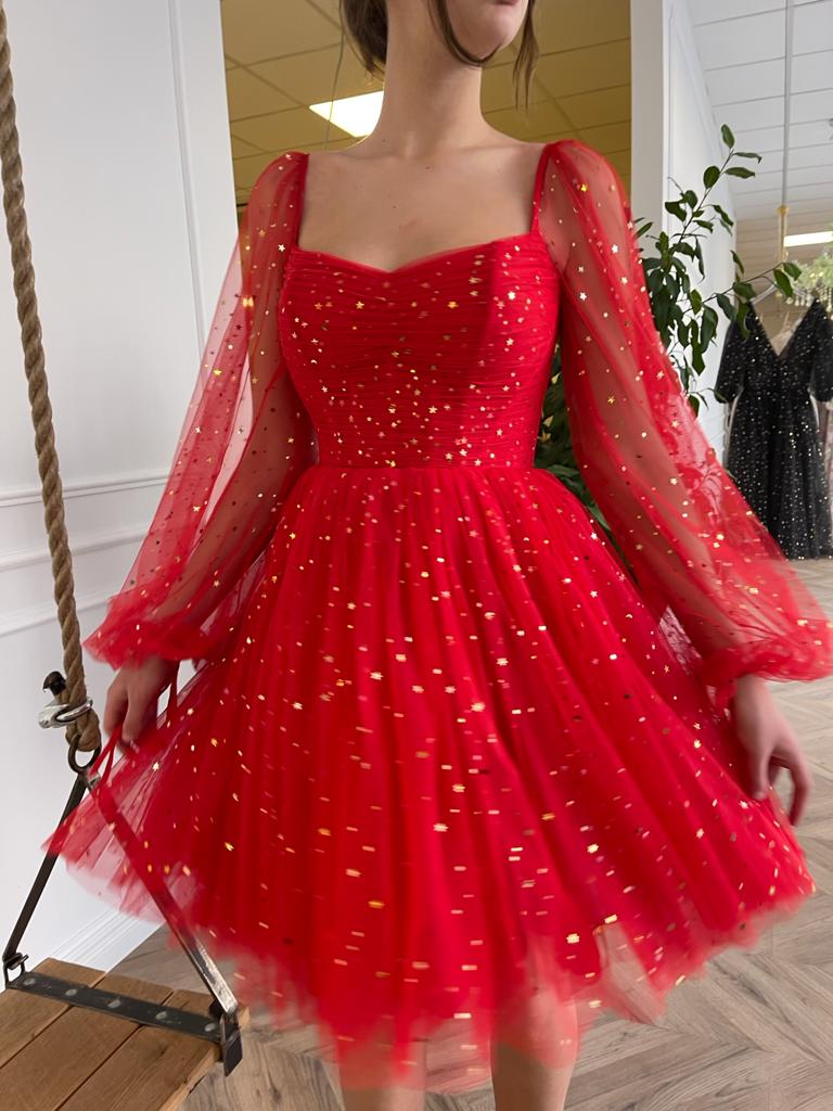 Red mini dress with long sleeves and starry fabric