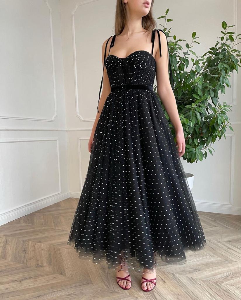 Black midi dotted dress with spaghetti straps and belt