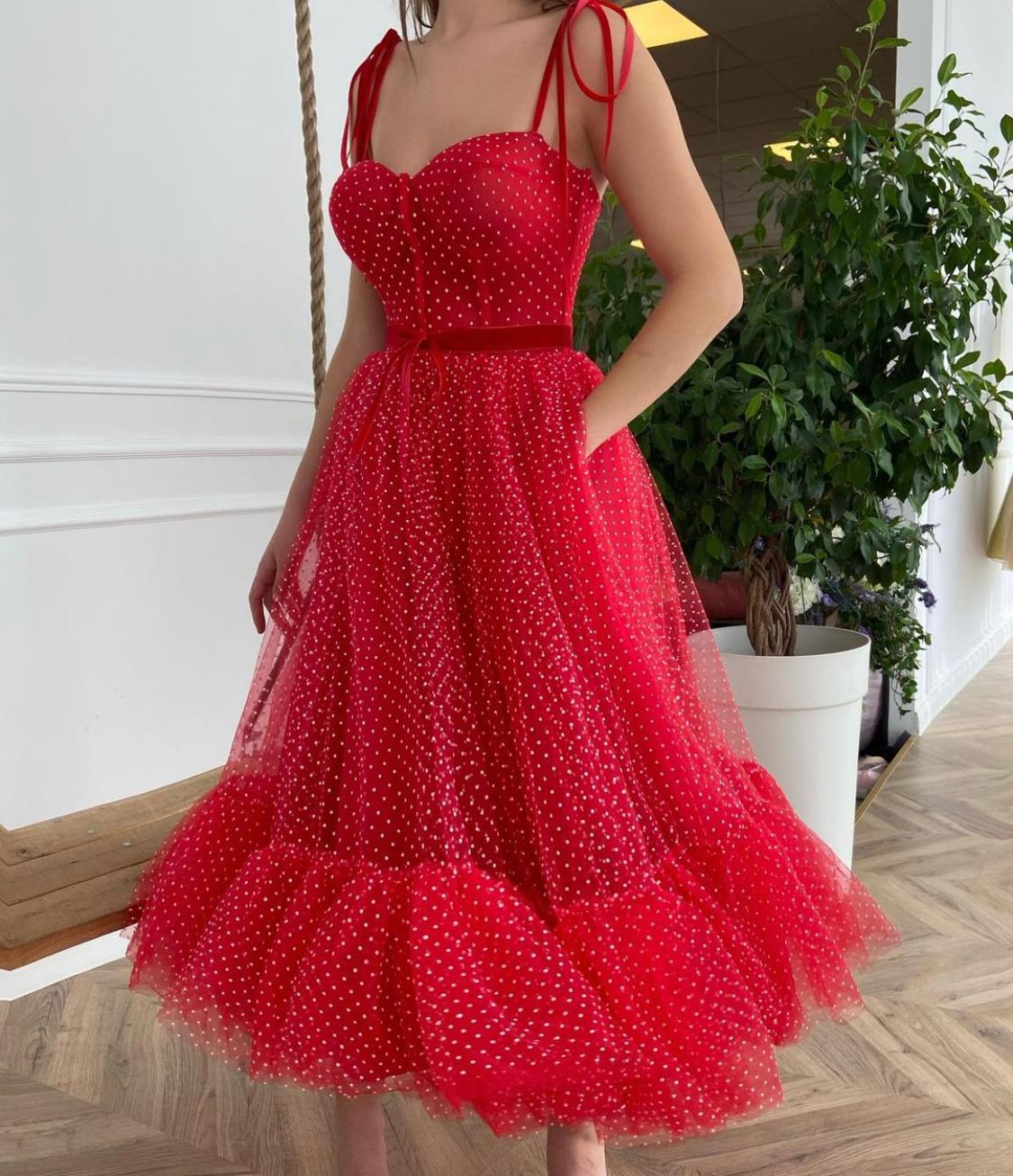 Red midi dotted dress with spaghetti straps