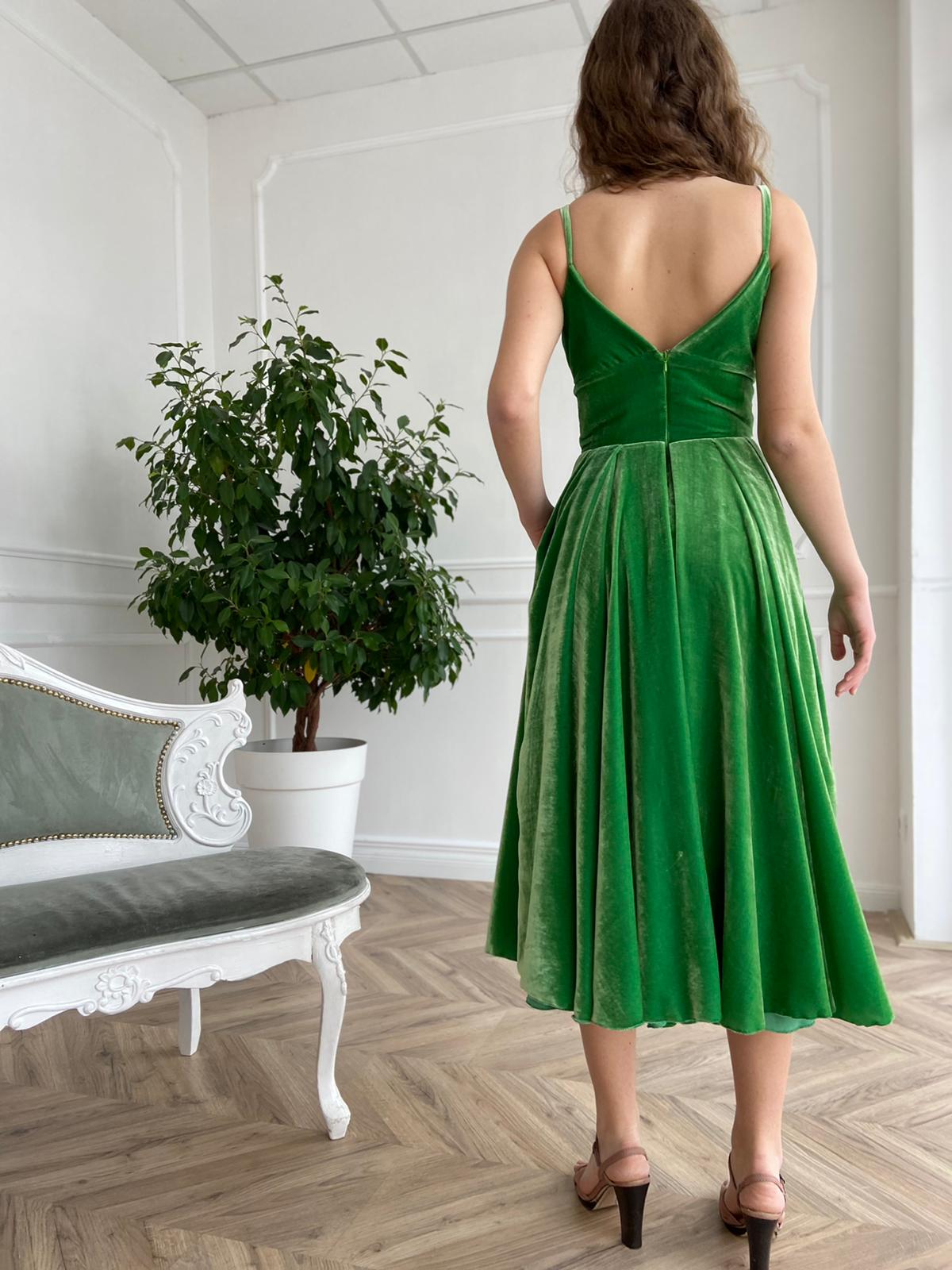 Green midi dress with spaghetti straps and v-neck