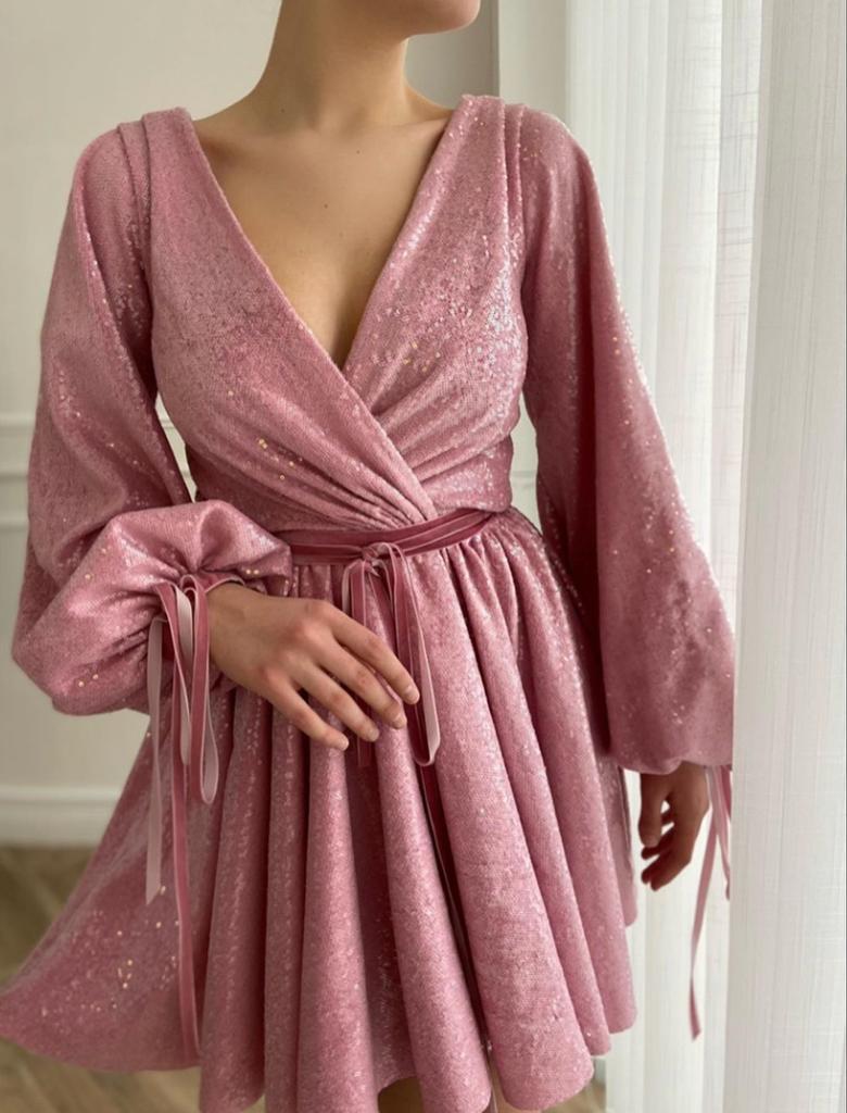 Pink mini dress with v-neck and long sleeves