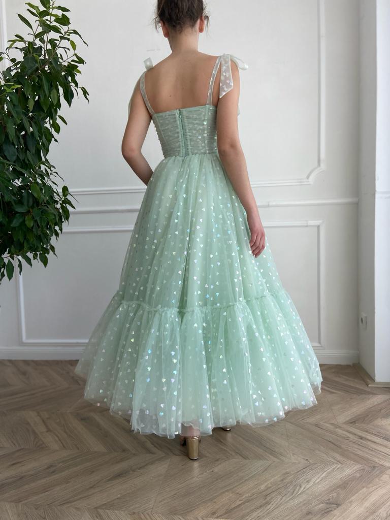 Green midi dress with bow straps and hearty fabric