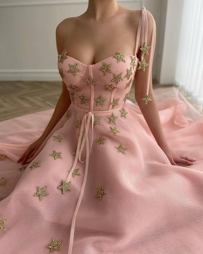 Pink midi dress with one spaghetti strap and embroidered stars