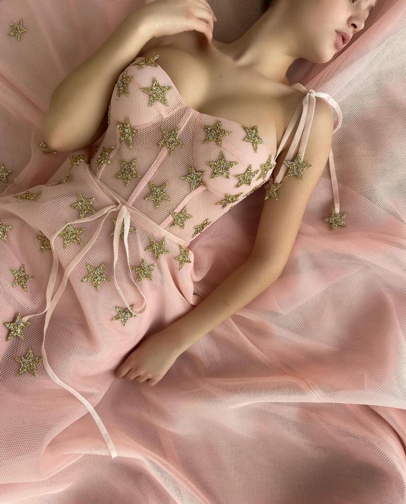 Pink midi dress with one spaghetti strap and embroidered stars