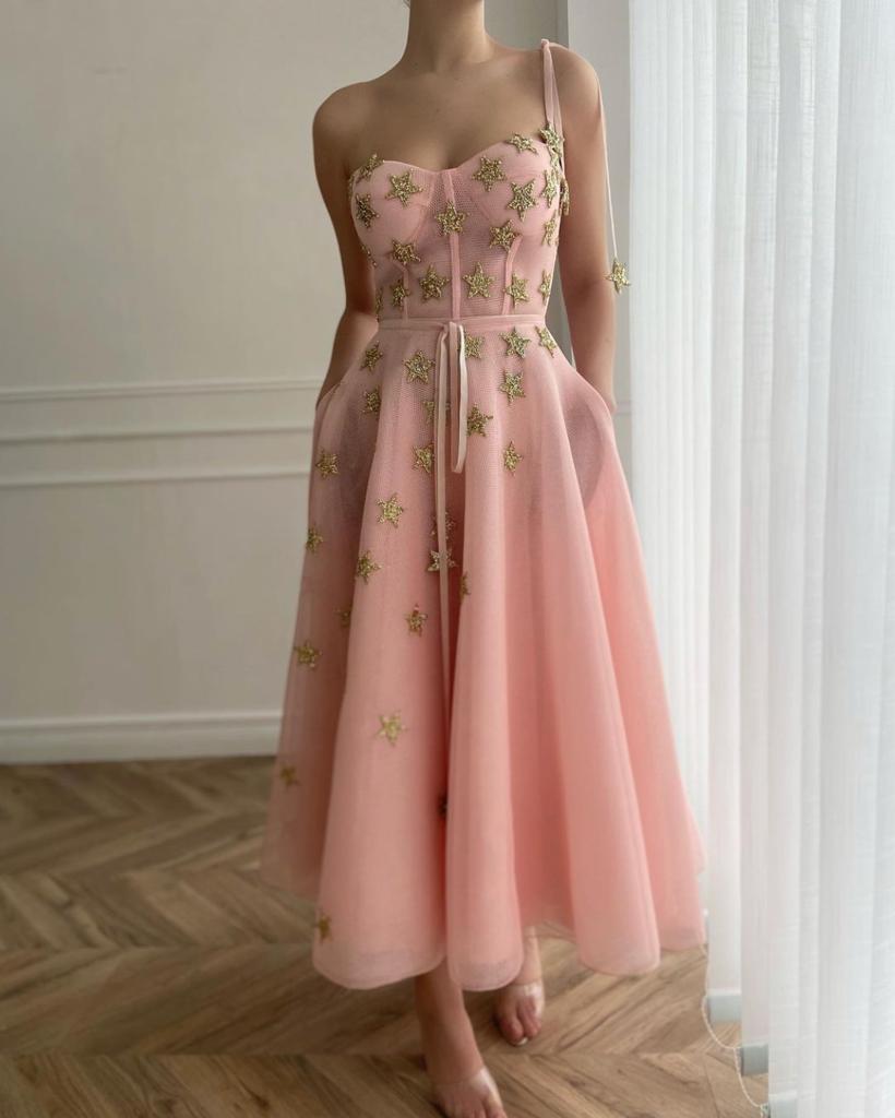 Pink midi dress with one spaghetti strap and embroidered stars