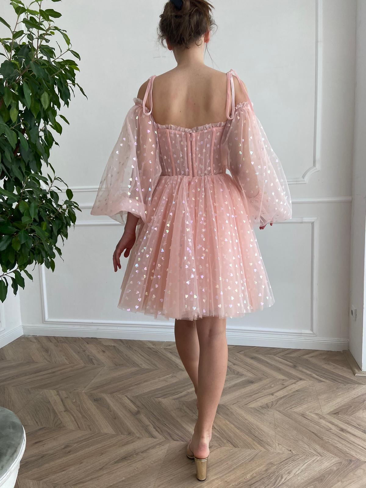Pink mini dress with long off the shoulder sleeves, spaghetti straps and hearty fabric