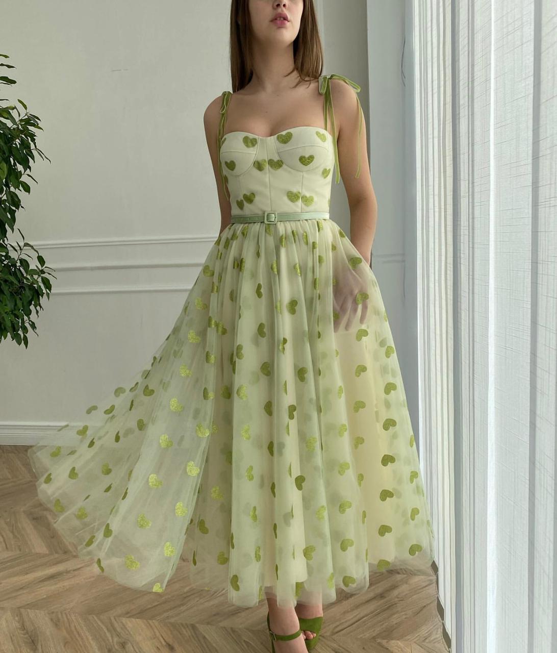 Green midi dress with hearty fabric and spaghetti straps