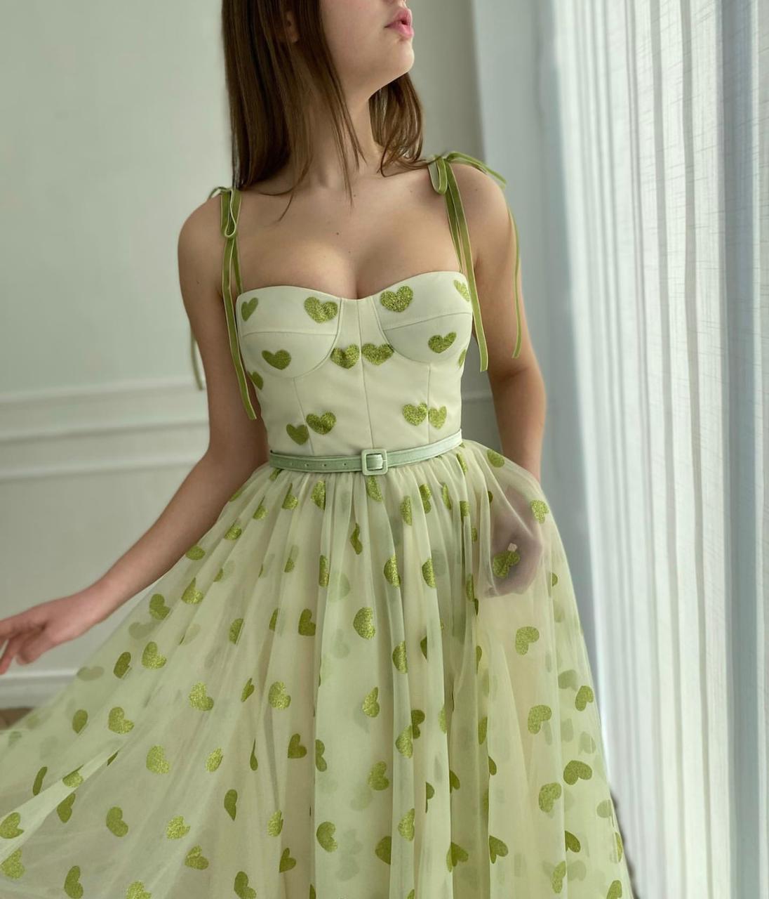 Green midi dress with hearty fabric and spaghetti straps