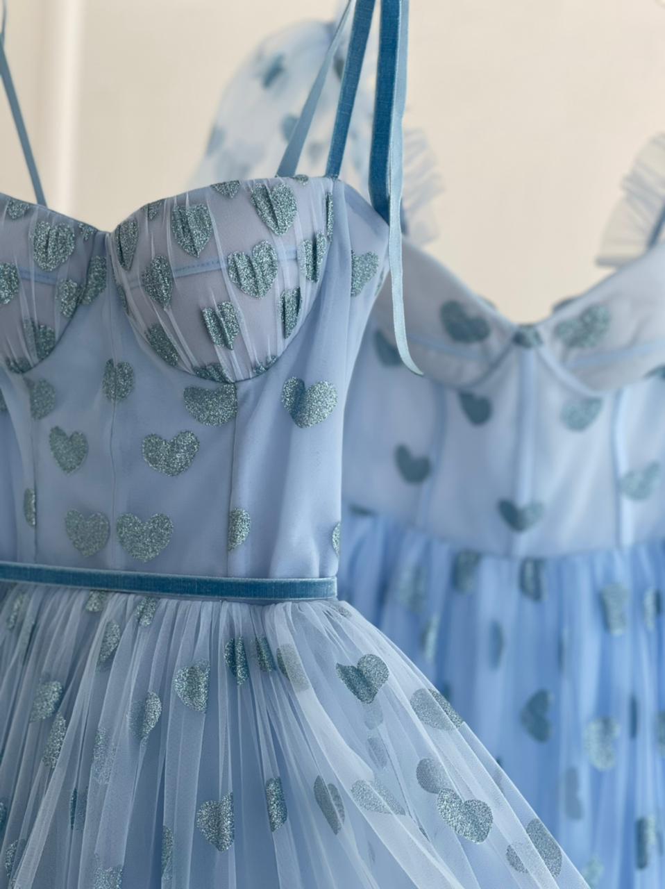 Blue midi dress with spaghetti straps and hearty fabric