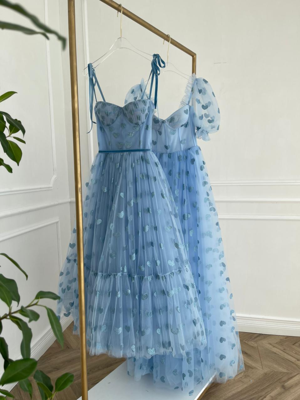 Blue midi dress with spaghetti straps and hearty fabric