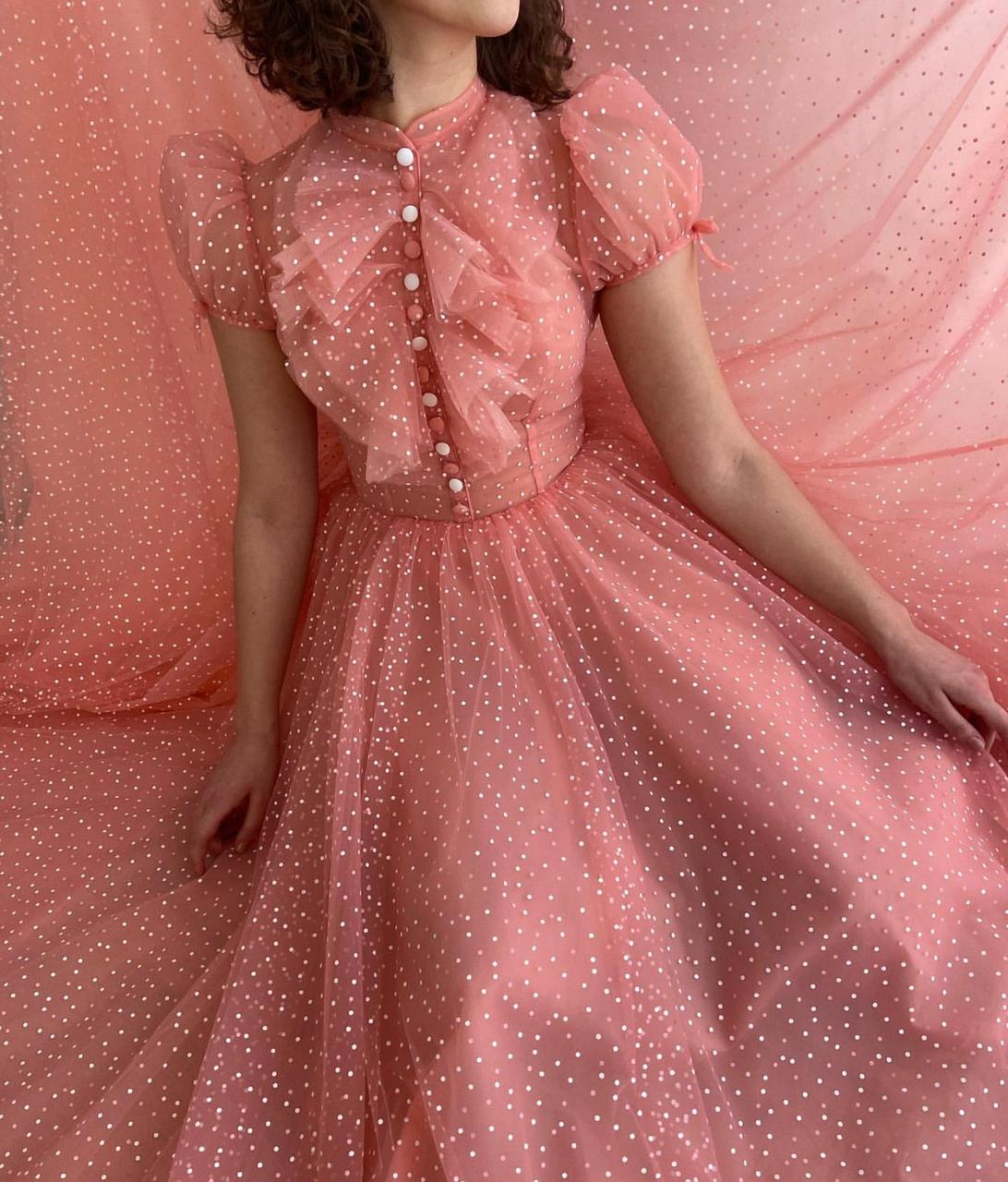 Pink A-Line dress with short cap sleeves and dotted fabric