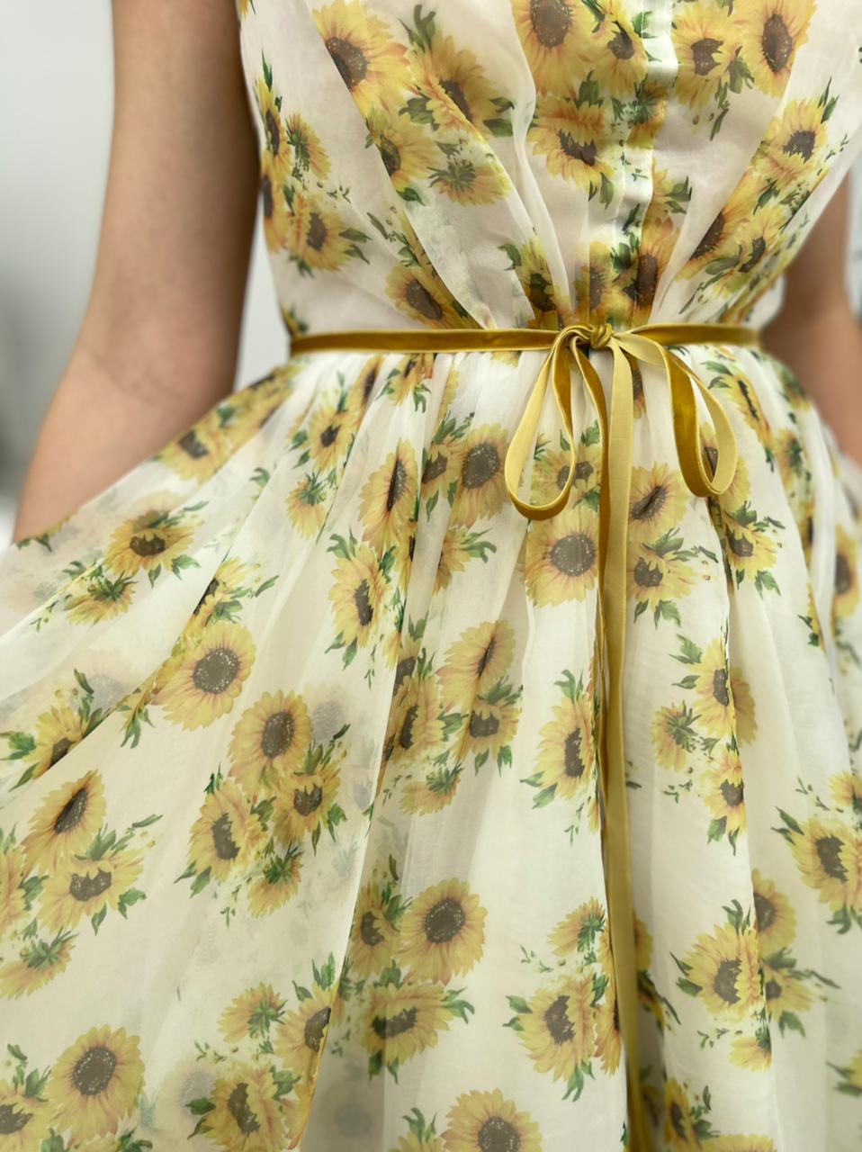 White midi dress with short sleeves and printed flowers