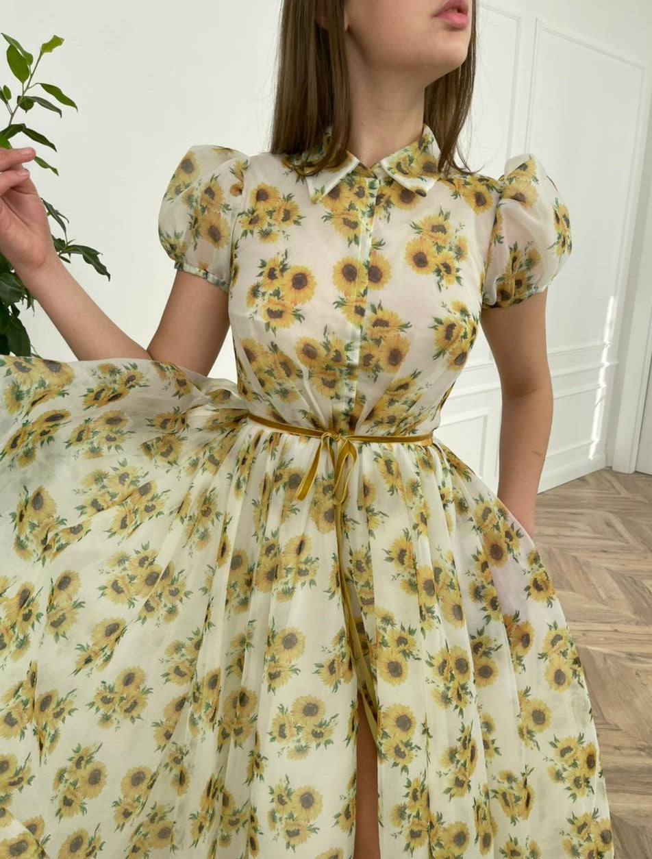 White midi dress with short sleeves and printed flowers