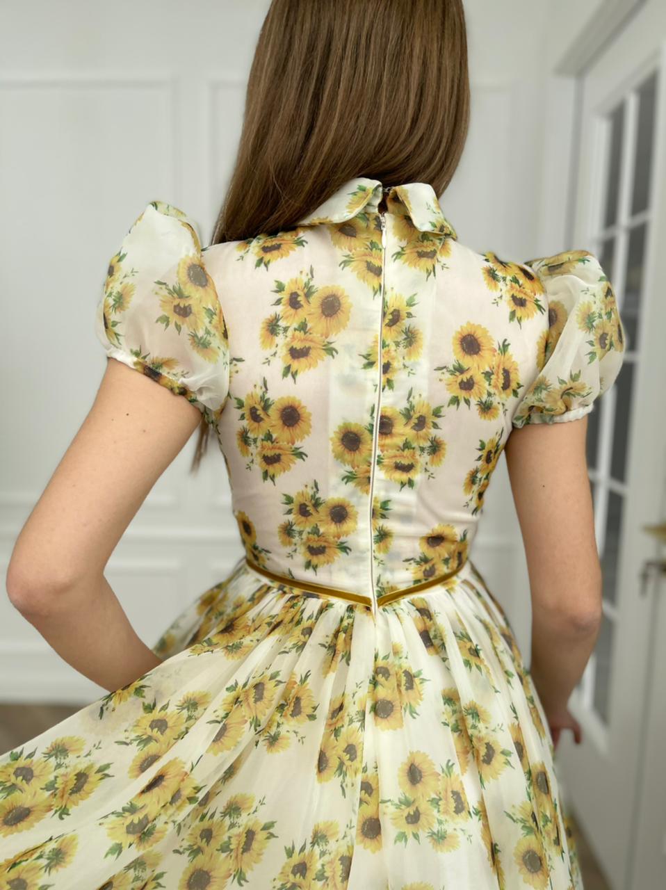 White midi dress with short sleeves and printed flowers