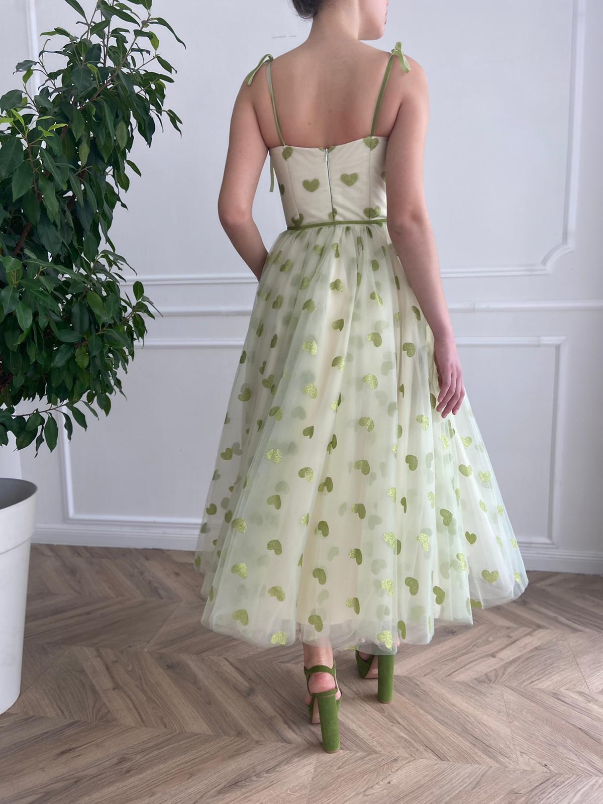 Green midi dress with hearty fabric and spaghetti straps