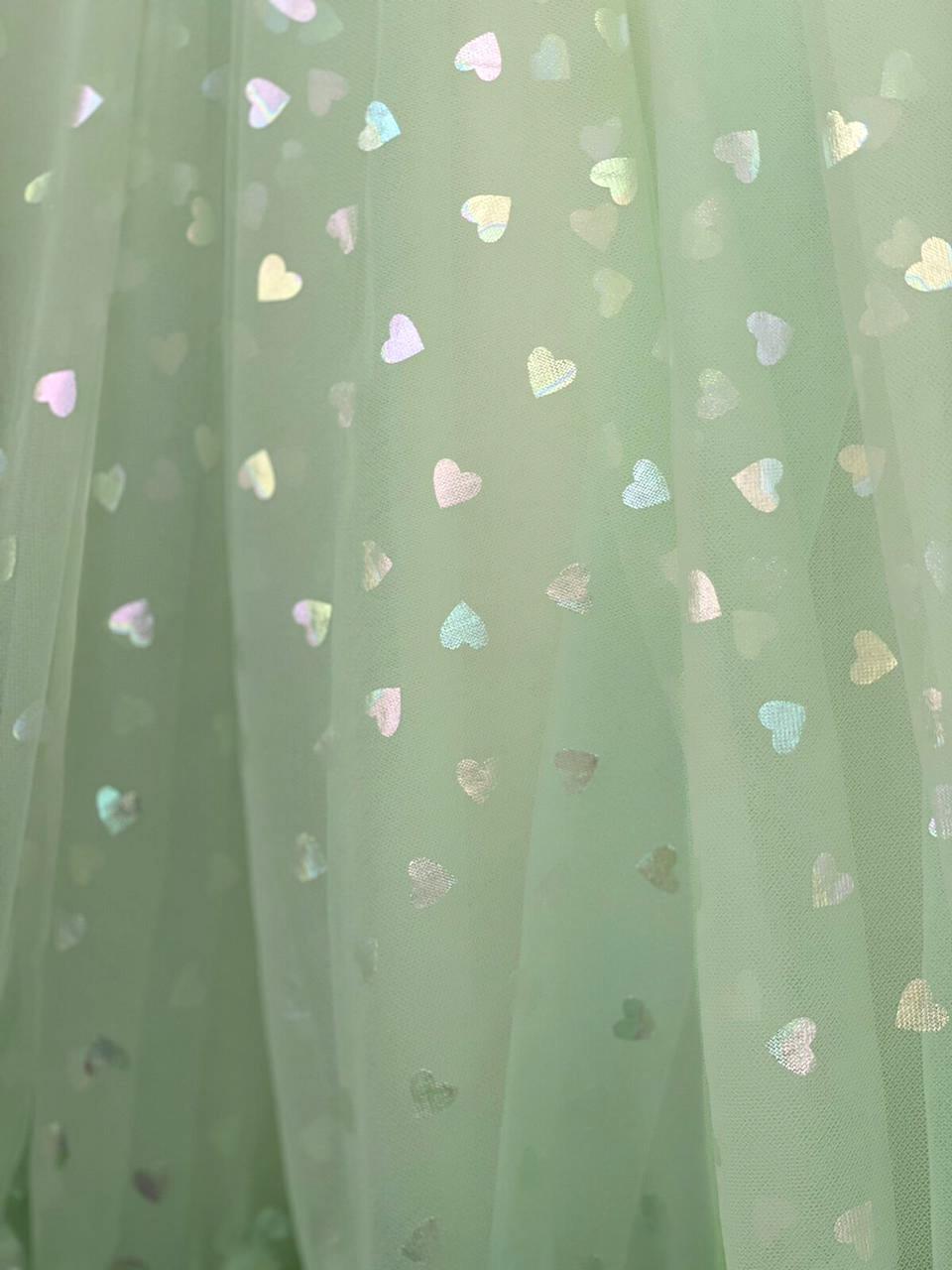 Midi green dress with printed hearts and spaghetti straps