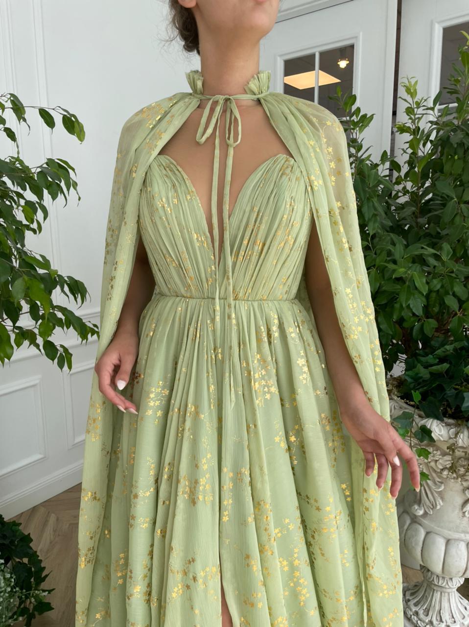 Green A-Line dress with no sleeves, v-neck and cape 