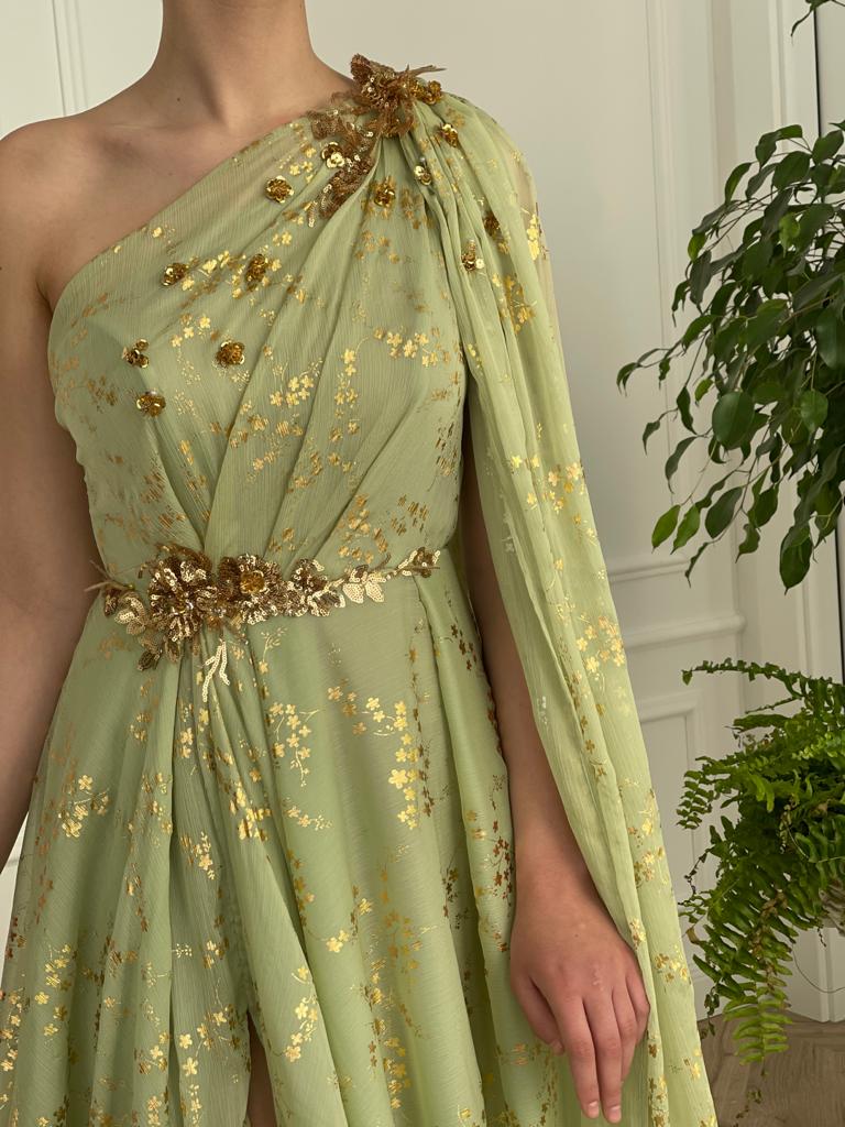 Green A-Line dress with embroidery, one shoulder sleeve and cape sleeve