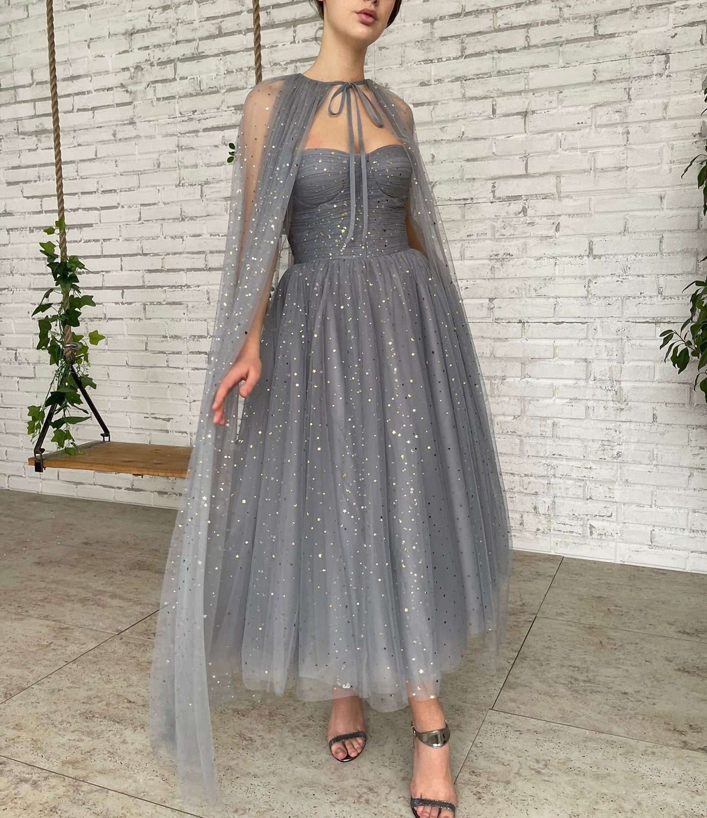 Grey midi dress with starry fabric and cape