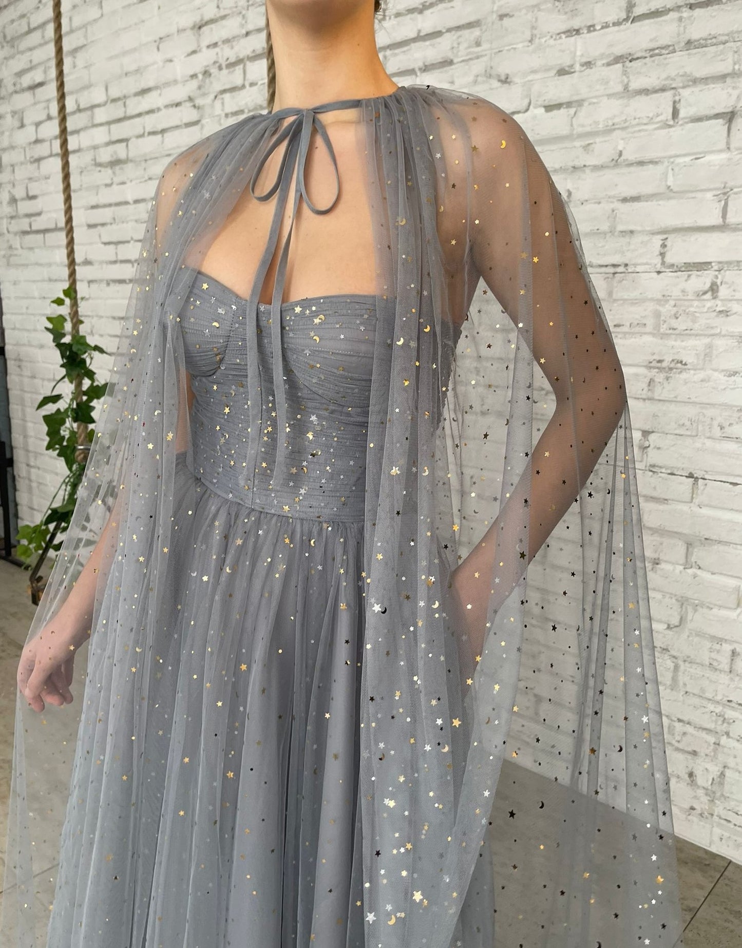 Grey midi dress with starry fabric and cape