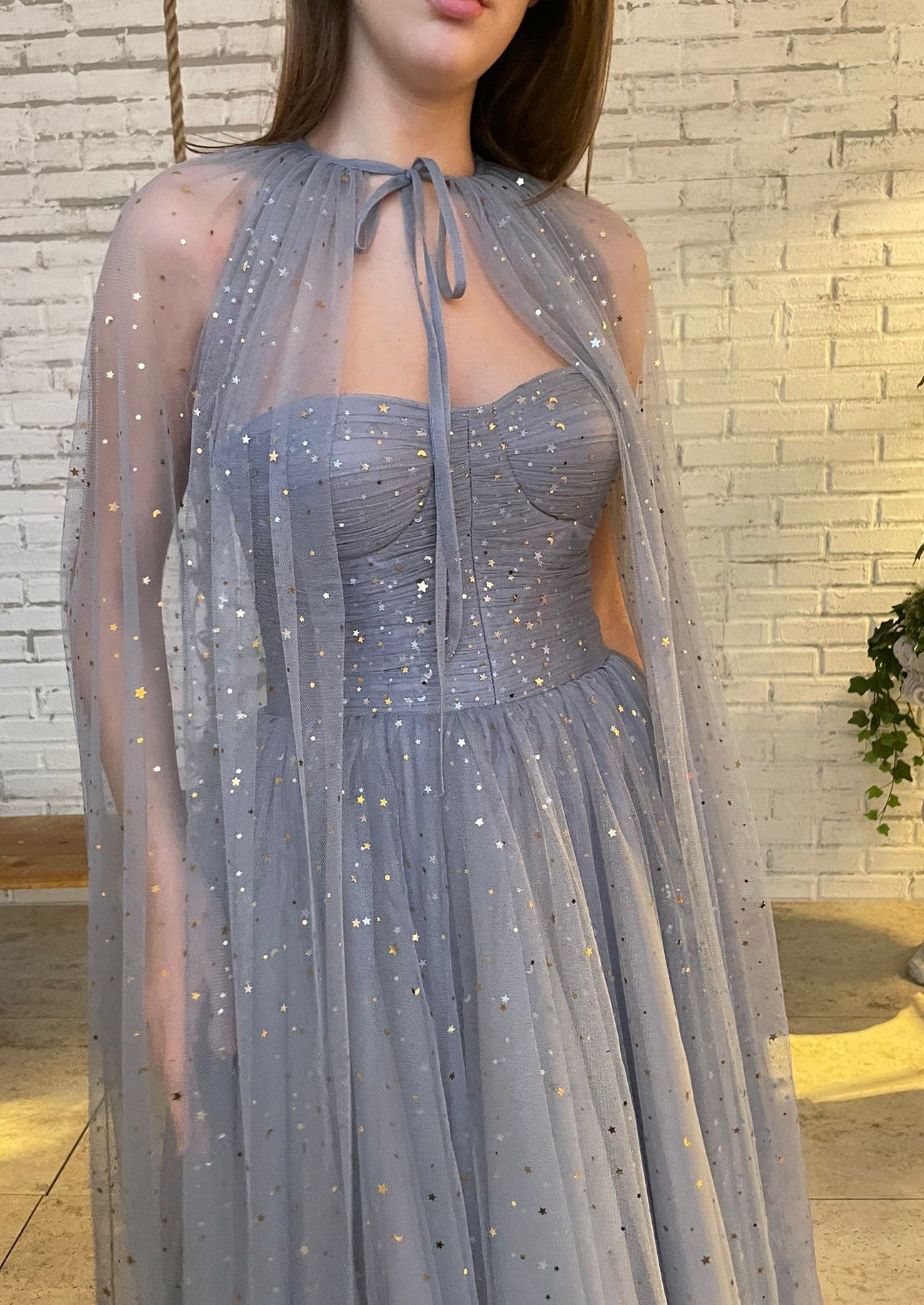 Grey midi dress with starry fabric and cape