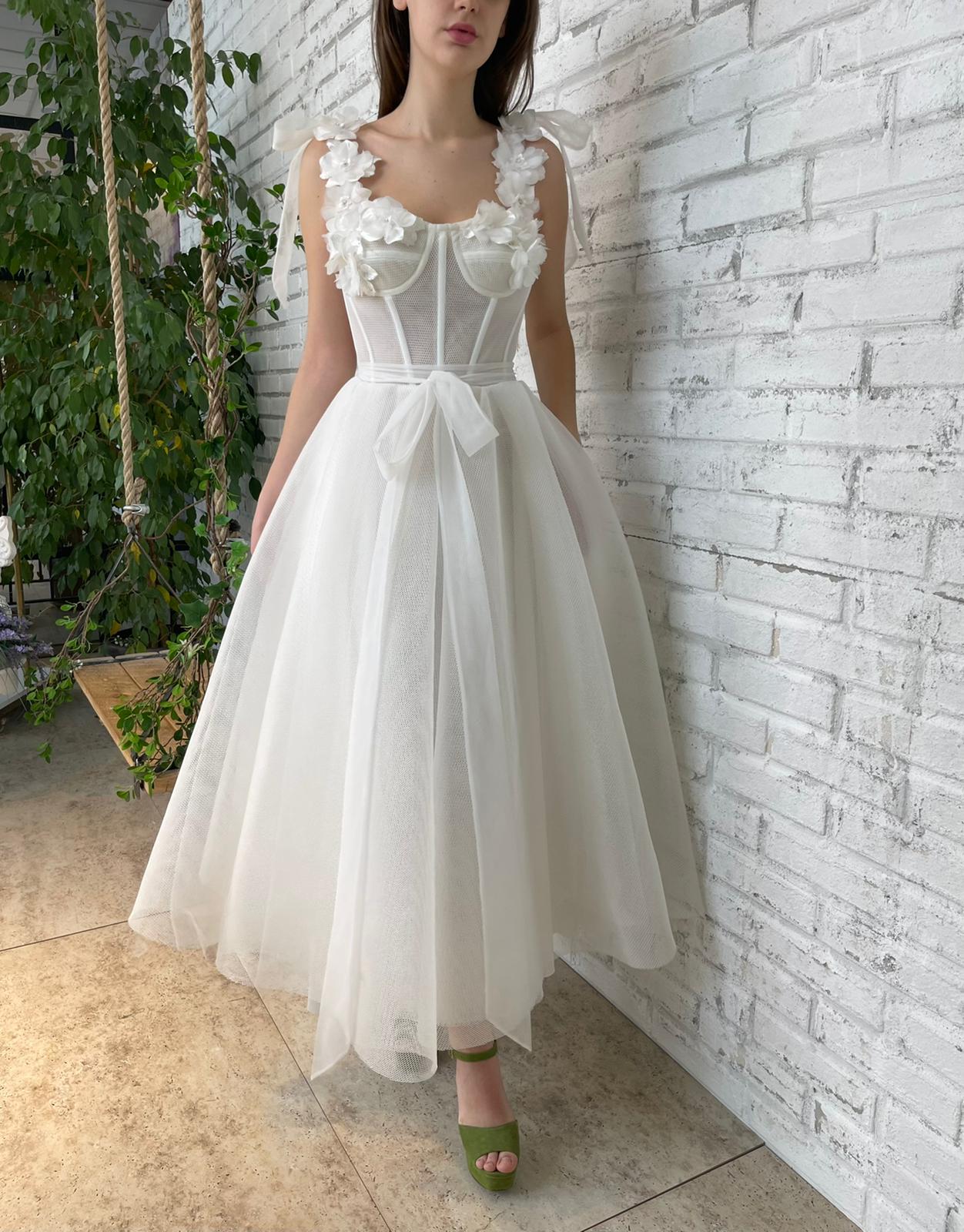 White bridal midi dress with straps, flowers and embroidery