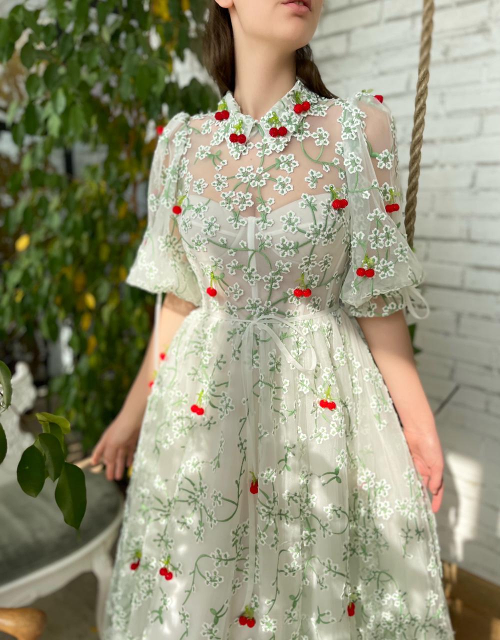 White and green midi dress with short sleeves, daisies and cherries