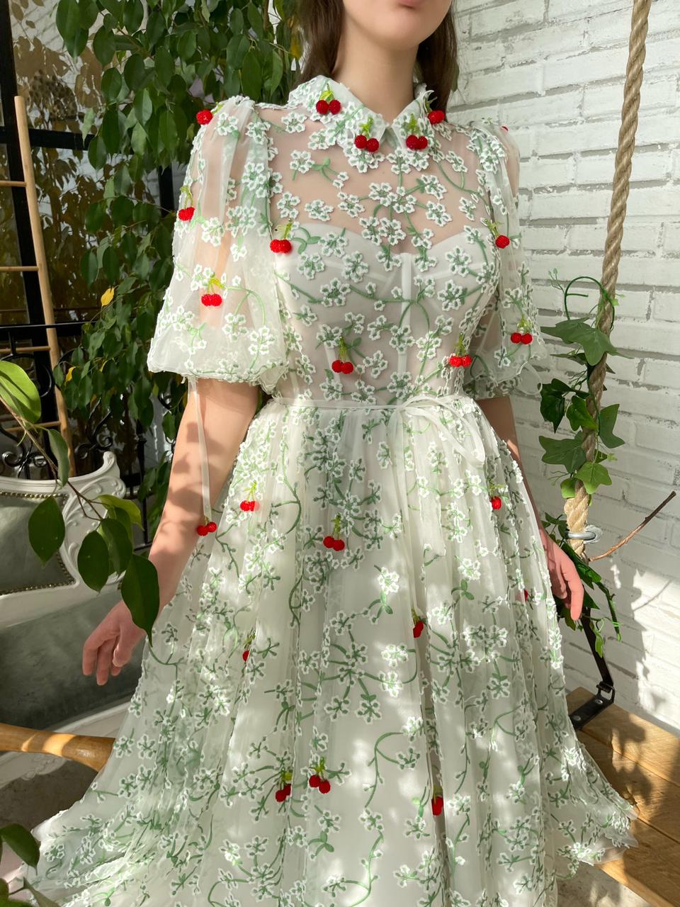 White and green midi dress with short sleeves, daisies and cherries