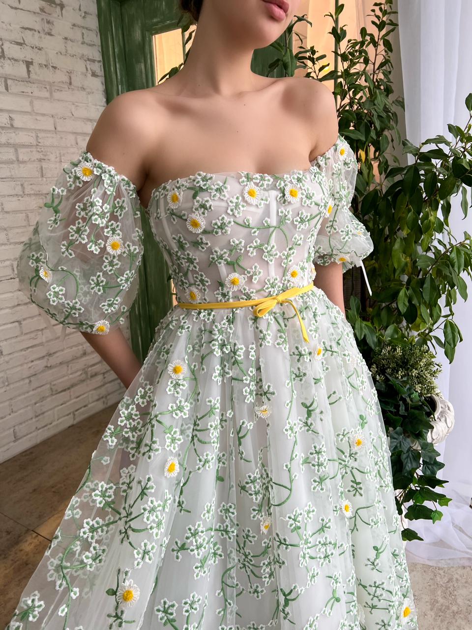 White and green midi dress with off the shoulder sleeves and daisies