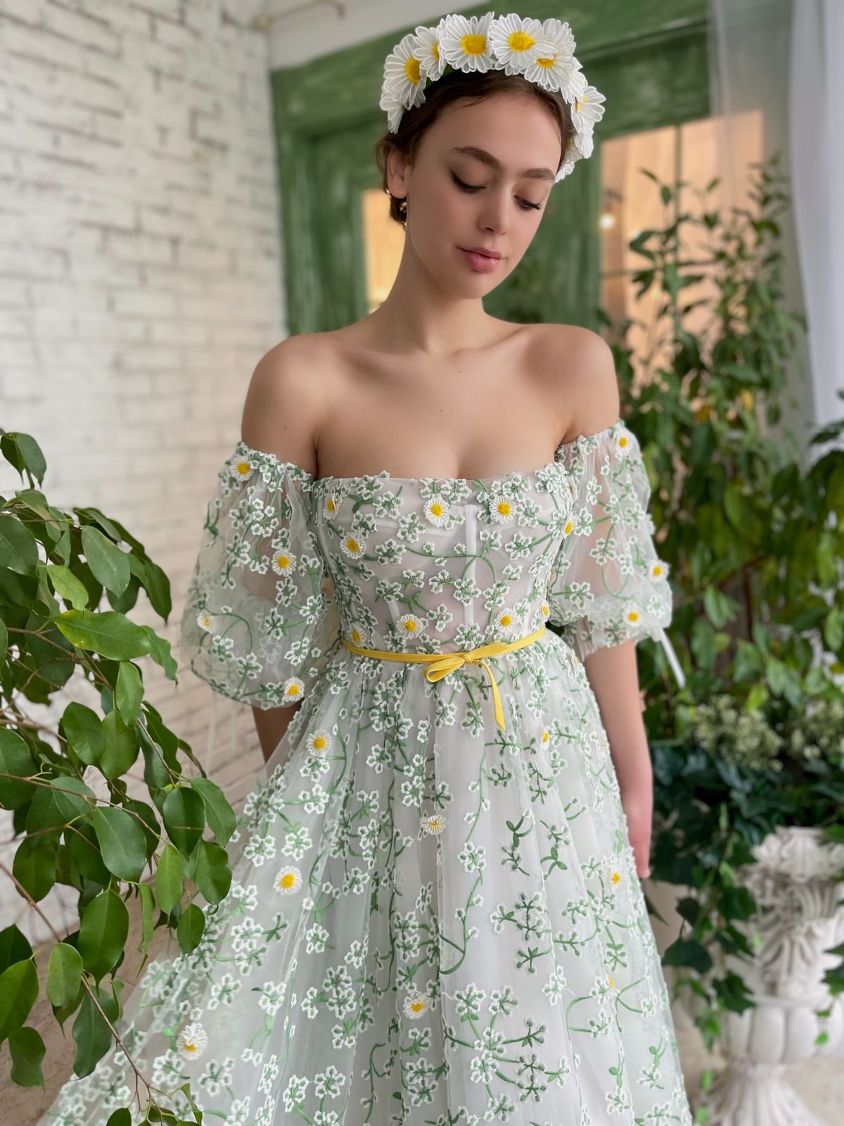 White and green midi dress with off the shoulder sleeves and daisies